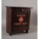 Cuxson, Gerrard & Co Ltd - A vintage Sanoid First Aid Case, stained beech case with drop down