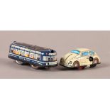 A vintage printed tinplate clockwork 'City-Bus 15', 9.5cm long; a vintage Japanese printed