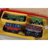 A Mettoy O Gauge tin plate clockwork Goods-Train with 0-4-0 No 490 locomotive and tender, green with