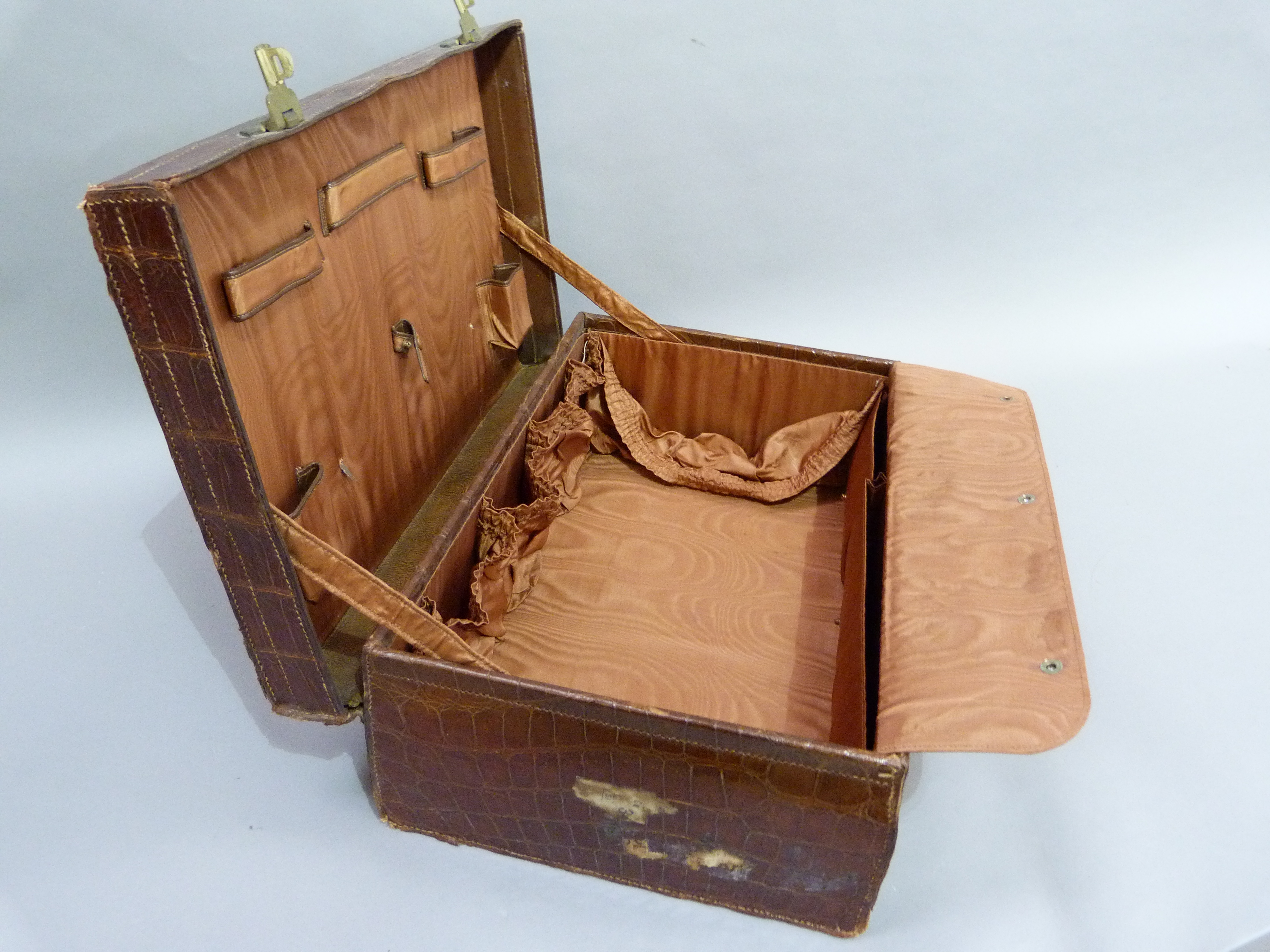 An early 20th century crocodile skin suitcase by Arthur Barber of Bradford, the interior lined in - Image 3 of 3