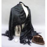A fur muff style handbag with lockable frame, with key and a large black shawl with fringe