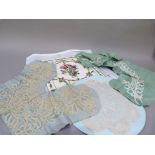 Two lace collars and a lace circular mat and a tapestry panel