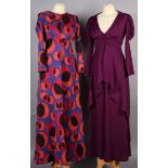 A black, purple and orange circle print backless full length evening dress, approximately size 8,