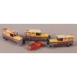 Three Vintage German printed tin plate vehicles with driver, pierced grey wheels with black centres,