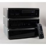 An AVI S2000 MA power amplifier, S2000 MP Pre Amplifier, and S2000 MC CD player; together with S2000