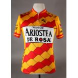 An Italian polyester cycle shirt the front and sleeves emblazoned Ariostea Derosa, Ceramiche, size 4