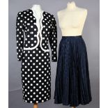 Louis Feraud, a black and white polka dot two piece suit, scalloped edge to edge jacket and slim