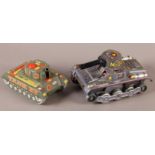 A Vintage Modern Toys (Japan) printed tinplate clockwork M-34 tank, the turret with hinged lid,