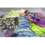 A quantity of scarves, various colours and patterns including silk, cashmere and wool