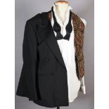 An Austin Reed gentleman's dinner jacket, size 36 regular, a pair of dress trousers, size 36