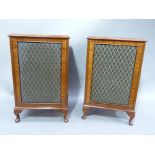 A pair of figured walnut and mahogany crossbanded and veneered Dynatron speakers on short cabriole