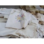 Embroidered panels and mixed table linens