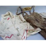 A gentleman's traditional Austrian outfit circa 1930's of lederhosen with braces and a linen