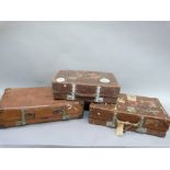 Three Revelation suitcases including a leather suitcase with labels for Durban, Dolomiti,