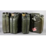 Four vintage green fuel cans, the front stamped BSC over CPW dated 1987, 48cm high approx (4)