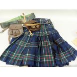 A Kilt of dark blue, black, green and red together with sporran and a leather belt, the