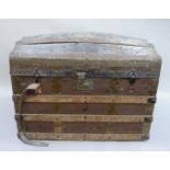 A canvas and wooden ribbed trunk, having a domed top, initialled 'JWES H', 76cm wide x 48cm deep x