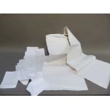 A pair of white damask table cloths, 180cm x 220cm approximately, and a set of six napkins (not