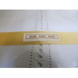A pair of hemstitched sheets and pair of matching pillowslips, double size, retailed by Brown &