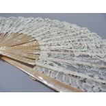 An ecru lace face with mother of pearl sticks (at fault) 35cm