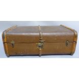 A 'De Luxe' canvas trunk with wooden ribbing, the interior fitted with a tray, initialled 'JWES',