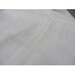 A white linen floral embroidered and drawn thread bedspread, double size, 268cm x 332cm