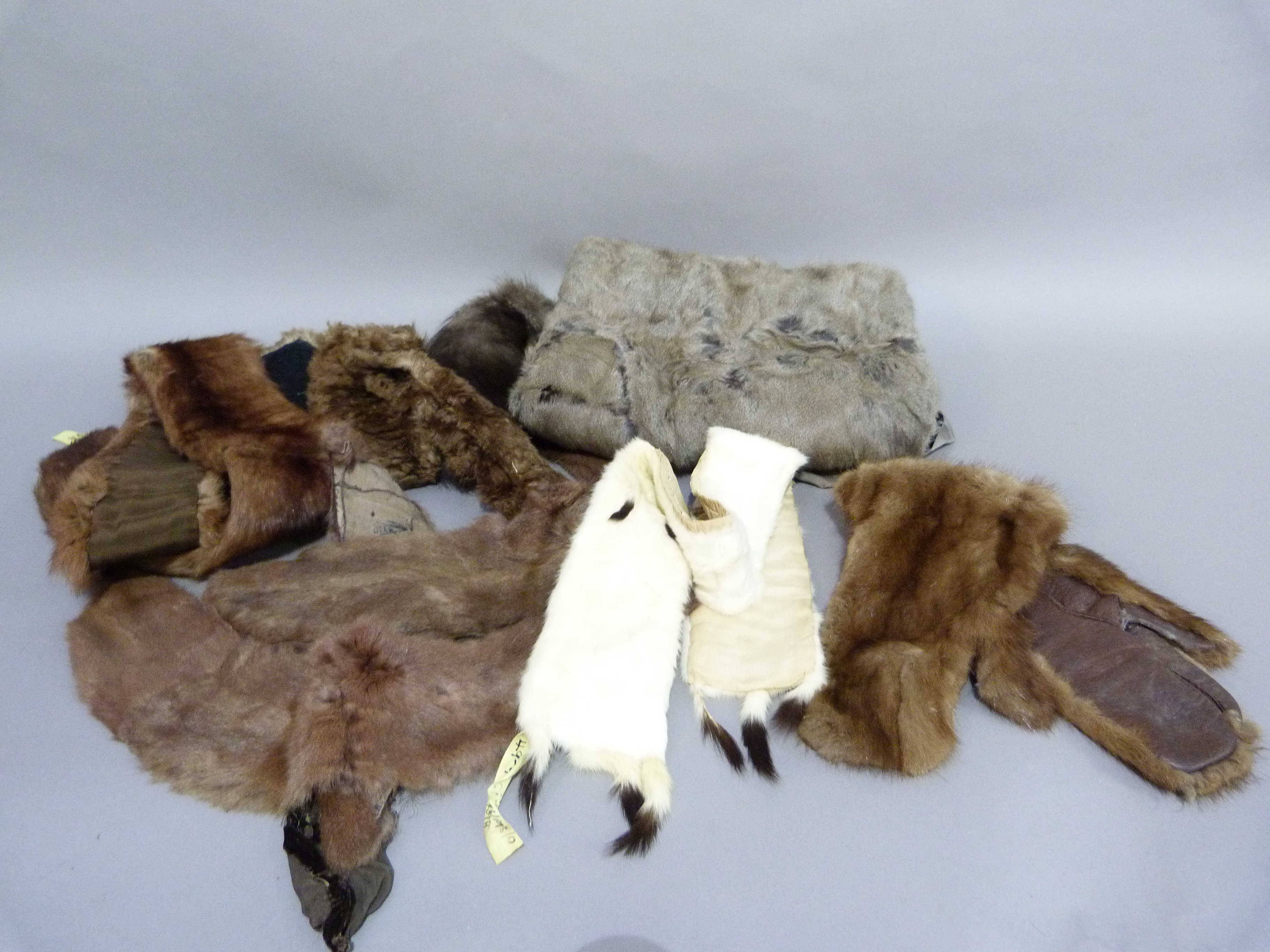 A grey fur hand muff; together with an ermine stole, a pair of fur gloves and various fur trims - Image 2 of 2