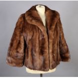 A mink jacket with three quarter length sleeves