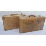 Two tan leather covered suitcases, one by Hemmingway of Huddersfield, 70cm x 34cm x 16.5cm and