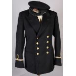 A 1950's naval uniform including jacket trousers and cap