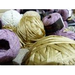 A quantity of knitting needles, wool and yarns including merino and silk mix