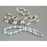 Four simulated pearl necklaces, each with large 12mm-15mm beads and approx 45cm in length