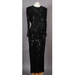 Frank Usher, a lady's evening dress, full length, black with all over rows of black sequins, size 12