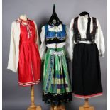 Four vintage and Icelandic traditional and fancy dress costumes; elaborately embroidered, from J