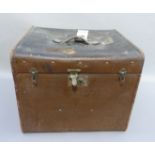 A vintage canvas box case initialled HH, with L+NW RY label and triangular stork brand metal