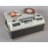 A Telefinken Magnetophon 95 Reel to Reel tape recorder; together with pamphlet (2)