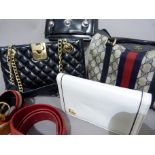 A Gucci canvas handbag no.6902006, A Jaeger dark blue quilted leather handbag on gilt chain, a black