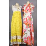 A yellow and white pink floral print maxi dress, sleeveless, size 14, a cream floral full length