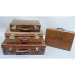 Two vintage tan leather covered suitcases and two pressed card 'leather' finish cases, one