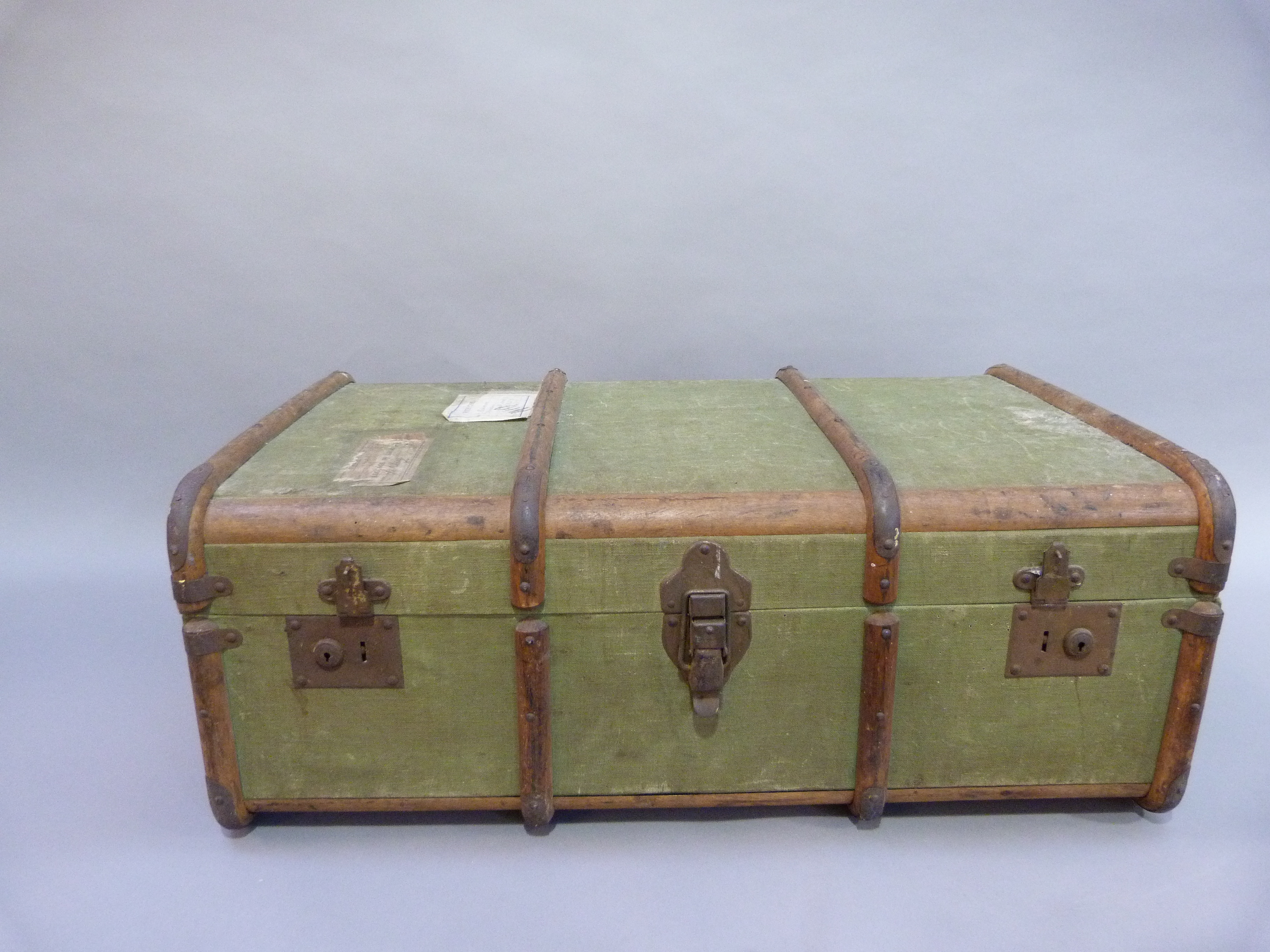 A canvas trunk with wood ribbing with luggage labels 'Luggage in Advance' 85cm wide x 52cm deep x - Image 2 of 4