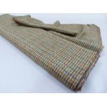 A length of Harris Tweed in blue, red and green stripe on camel ground