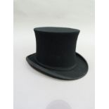 A gentleman's folding top hat by Gieves Ltd, size 6 3/4, in original box