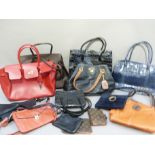A quantity of handbags, copy designer wallets, filofax, bags, Rayne navy suede handbag, two large