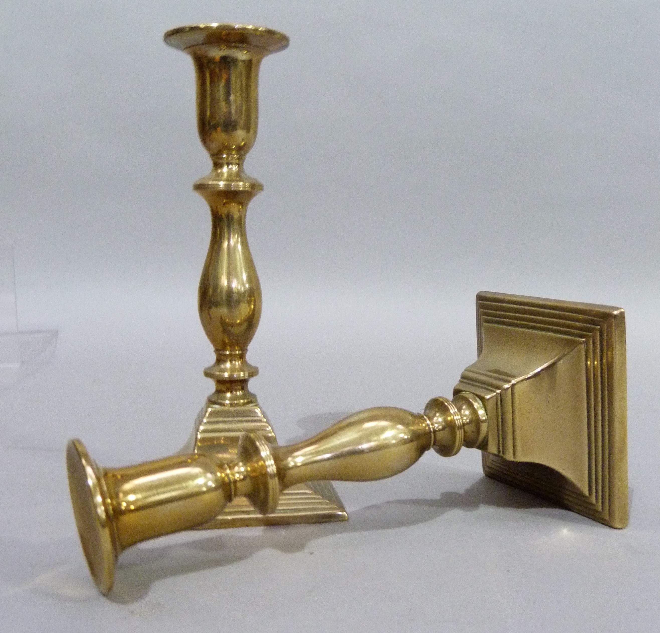 A pair of nineteenth century brass candlesticks of baluster outline on square stepped bases, 19cm - Image 4 of 4