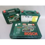 A Bosch model pss200a sander, cased; a Bosch psr1440 drill driver, cased, a Bosch psm100a 100watt