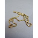 An Edward VII neckchain in 9ct gold facetted belcher and wire links, approximate length 46cm,