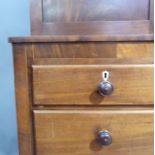 A George IIII mahogany chest of drawers the top above two short and three long graduated doors