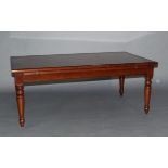 A Cherrywood coffee table, rectangular plank top and pull out slide, on turned legs, measuring 118cm