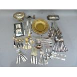 A quantity of silver plated ware including mother of pearl handled fruit knives and forks, other