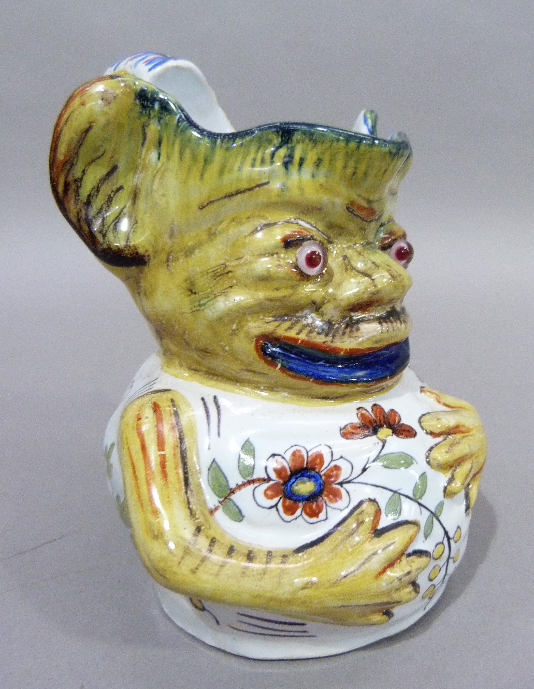 A Rouen faience grotesque face mask jug, marked to underside, 15cm - Image 3 of 5